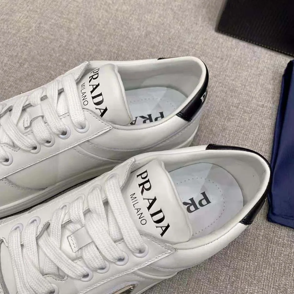 Prada Downtown Perforated Leather Sneakers for Women in White