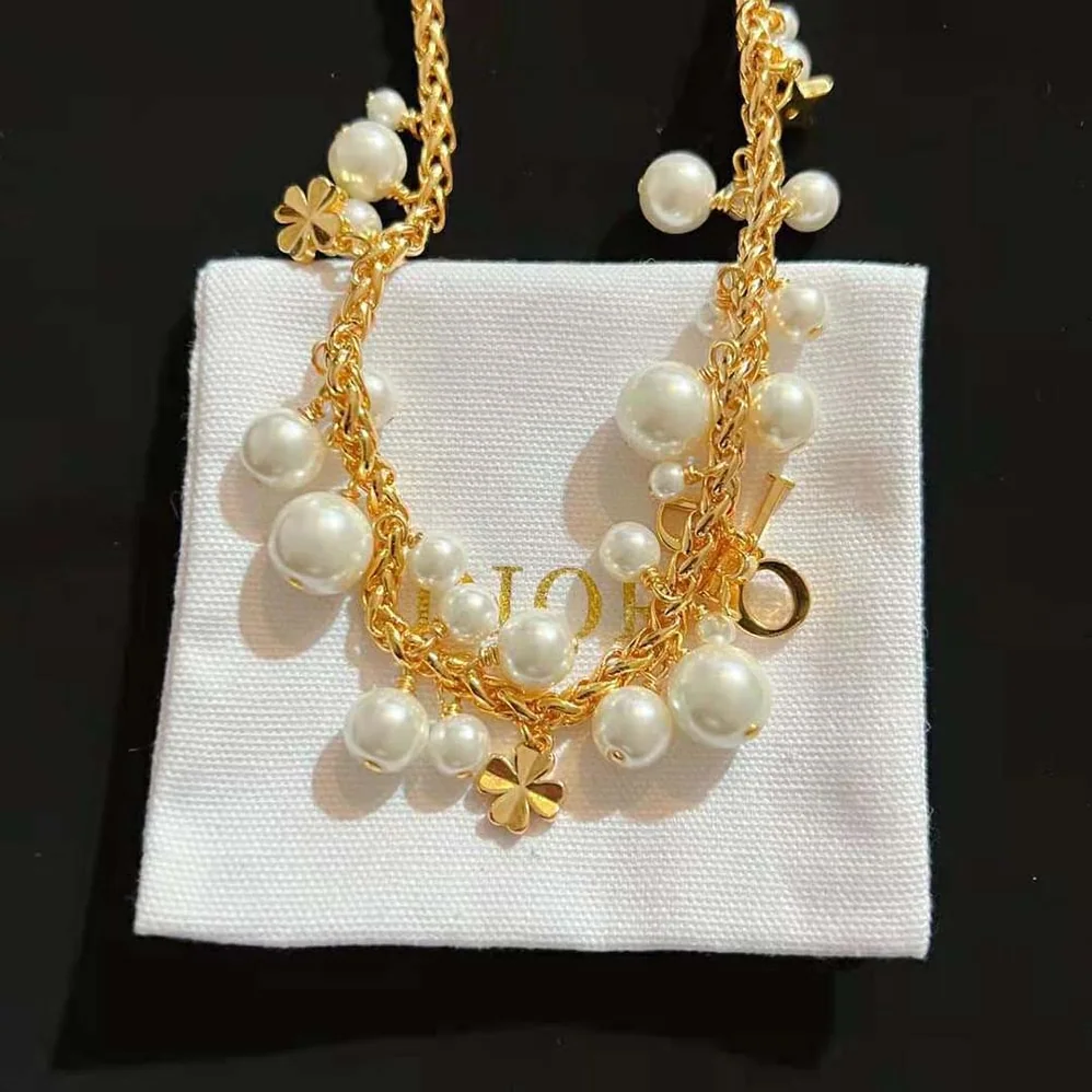 Dior Dio(r)evolution Necklace Gold-Finish Metal and White Resin Pearls for Women Dior Dio(r)evolution Necklace Gold-Finish Metal and White Resin Pearls for Women
