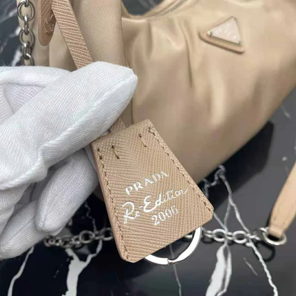 Prada Re-Edition 2006 Nylon Bag for Women in Sandy