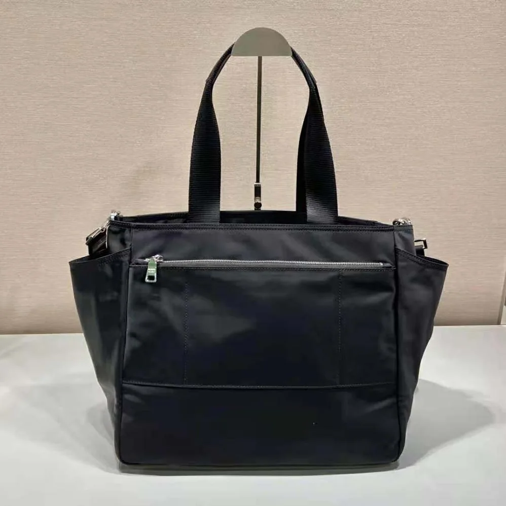 Prada Re-Nylon Baby Bag with Triangle Logo for Unisex in Black Prada Re-Nylon Baby Bag with Triangle Logo for Unisex in Black