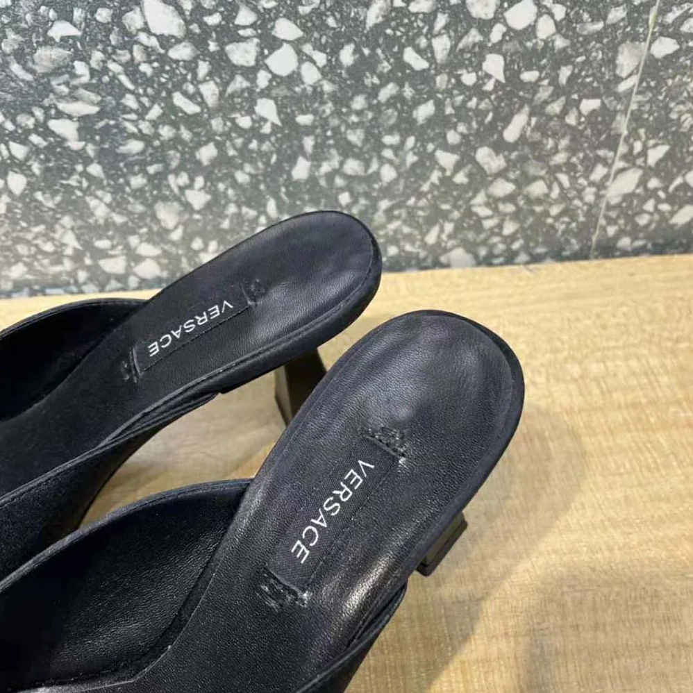 Versace Artifact Mid-Heel Mules for Women in Black Versace Artifact Mid-Heel Mules for Women in Black