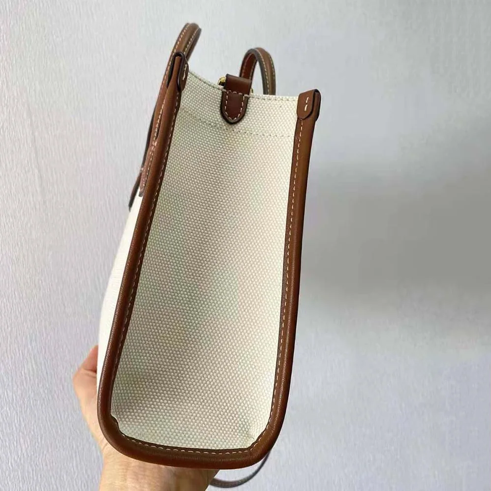 Burberry Mini Two-tone Canvas and Leather Freya Bag for Women in Brown Burberry Mini Two-tone Canvas and Leather Freya Bag for Women in Brown
