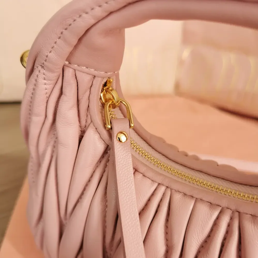 Miu Miu Wander Matelassé Nappa Leather Hobo Mini-Bag for Women in Powder Pink