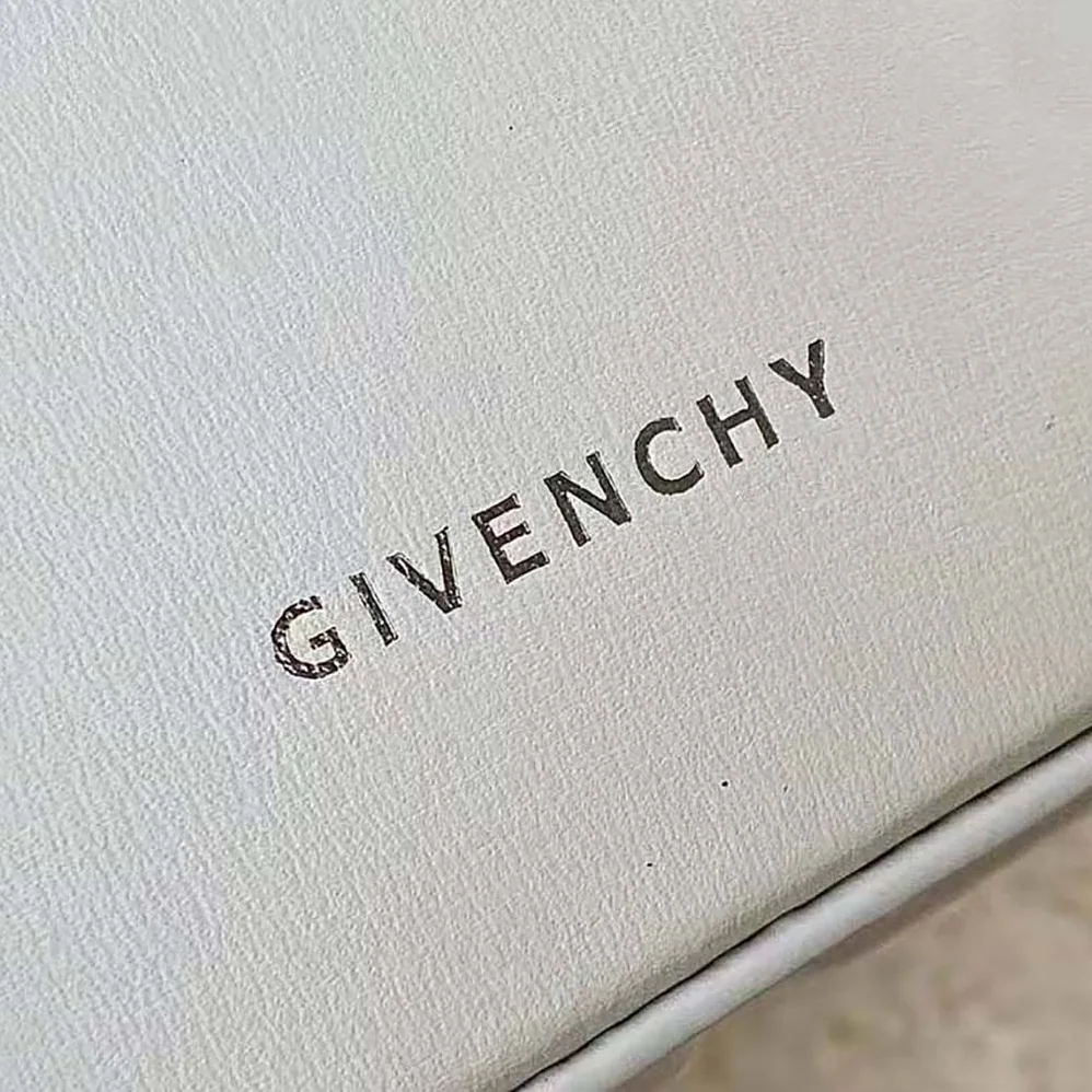 Givenchy Mini Cut Out Bucket Bag in Box Leather for Women in White Givenchy Mini Cut Out Bucket Bag in Box Leather for Women in White