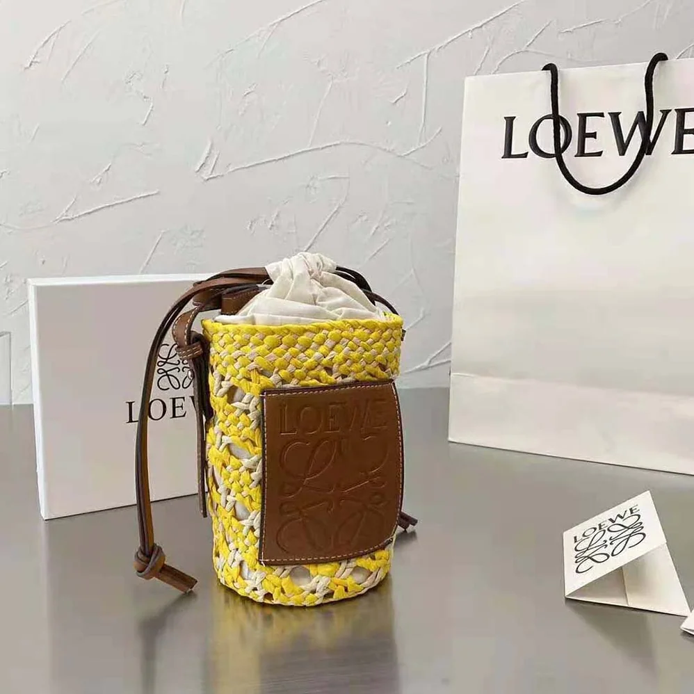 Loewe Cylinder Pocket in Iraca Palm and Calfskin for Women Loewe Cylinder Pocket in Iraca Palm and Calfskin for Women