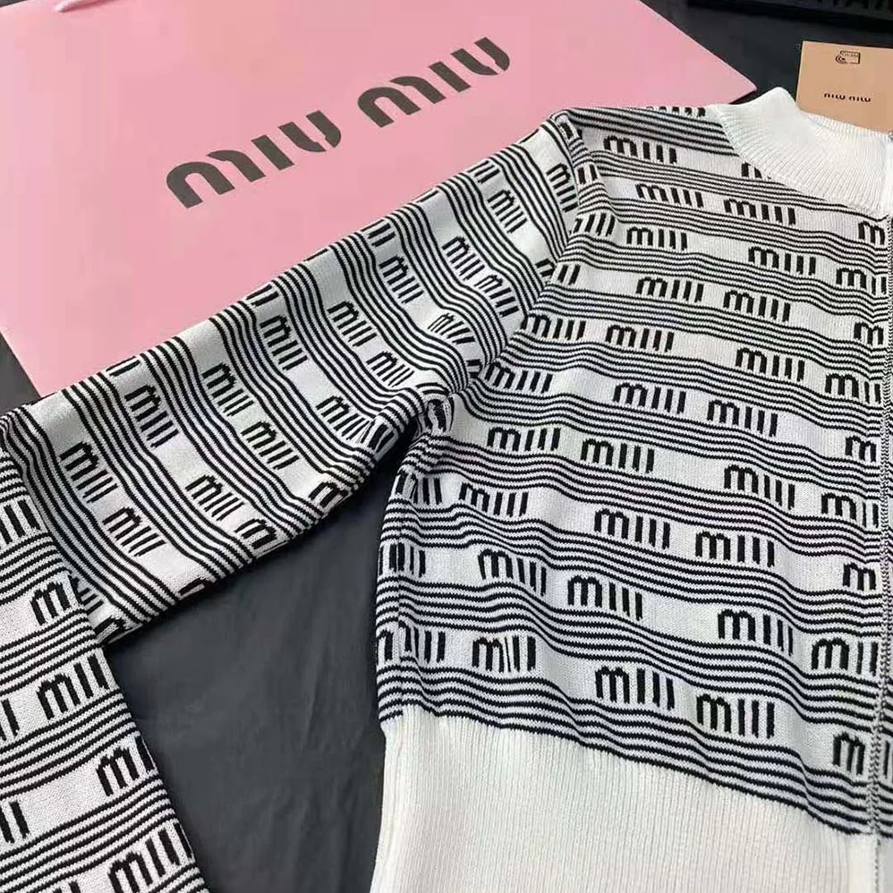 Miu Miu Cashmere and Silk Cardigan with Jacquard Logo for Women in White Miu Miu Cashmere and Silk Cardigan with Jacquard Logo for Women in White
