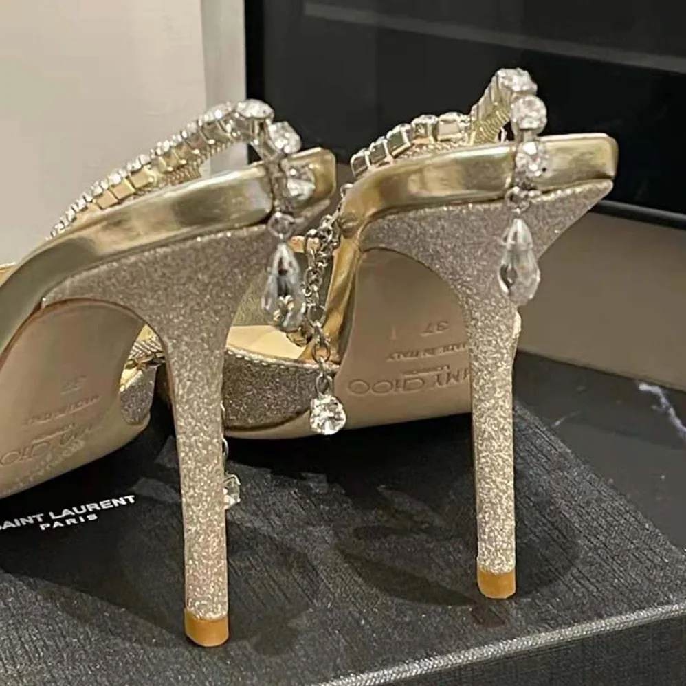 Jimmy Choo Saeda Sandal 100 Platinum Ice Dusty Glitter Sandals with Crystal Embellishment for Women Jimmy Choo Saeda Sandal 100 Platinum Ice Dusty Glitter Sandals with Crystal Embellishment for Women
