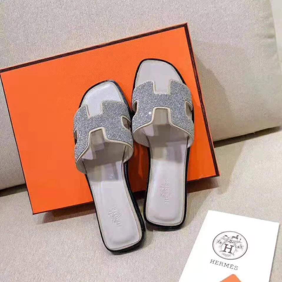 Hermes Oran Sandal Hermes Sandal in Metallic Nappa Leather and Cristal Powder for Women in Sandy
