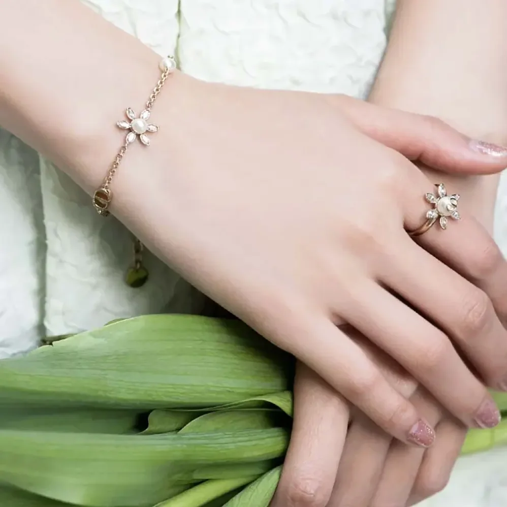 Dior Bloom in Dior Bracelet Gold-Finish Metal with White Resin Pearls and Silver for Women in Tone Crystals Dior Bloom in Dior Bracelet Gold-Finish Metal with White Resin Pearls and Silver for Women in Tone Crystals