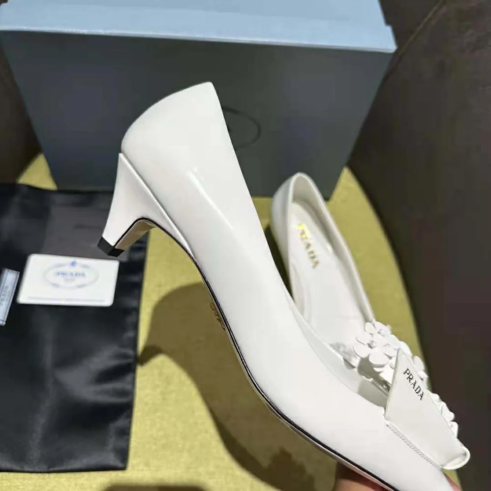Prada Brushed Leather Pumps with Floral Appliqués for Women in White