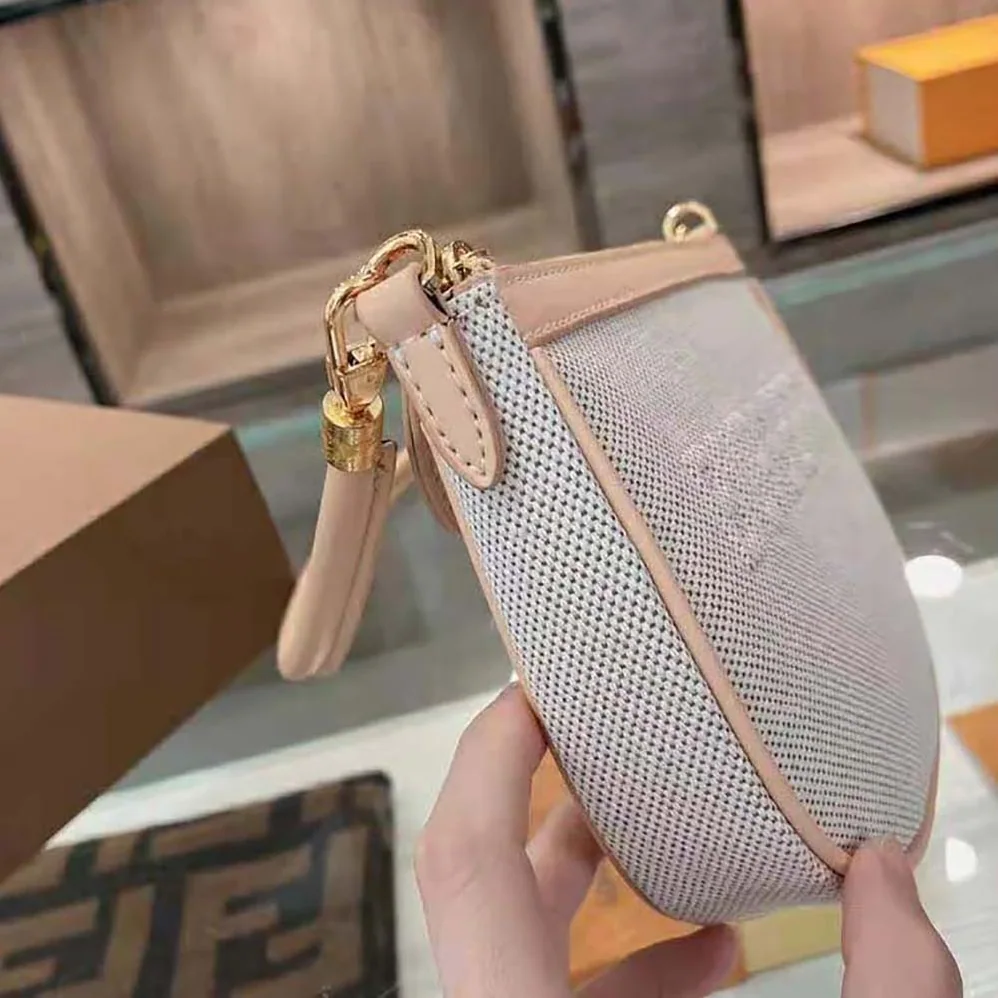 Burberry Embossed Logo Canvas and Leather Olympia Pouch for Women