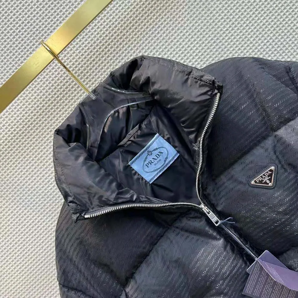 Prada Re-Nylon Cropped Hooded Down Jacket for Women in Black Prada Re-Nylon Cropped Hooded Down Jacket for Women in Black