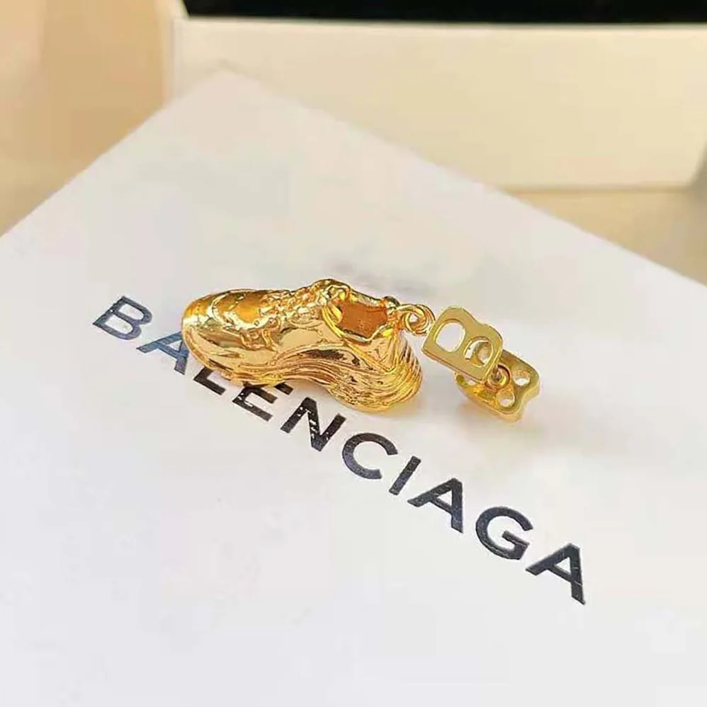 Balenciaga Mini Triple S Earring in Gold Bronze and Brass for Women Balenciaga Mini Triple S Earring in Gold Bronze and Brass for Women