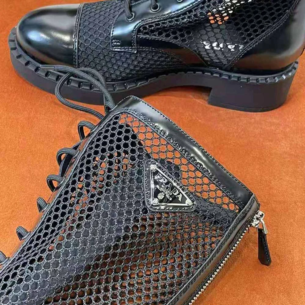Prada Brushed Leather and Mesh Boots for Women in Black