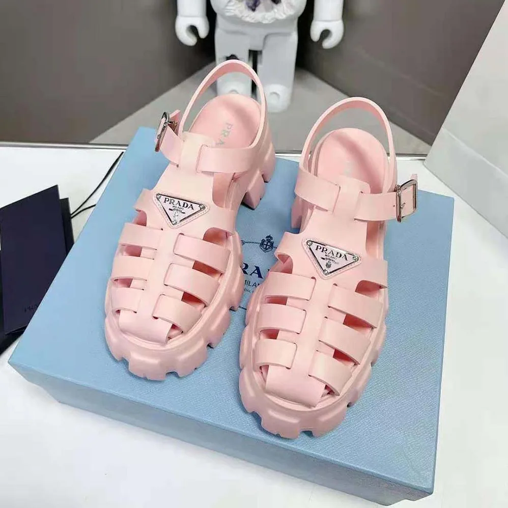 Prada Foam Rubber Sandals with Enameled Metal Triangle Logo for Women in Pink