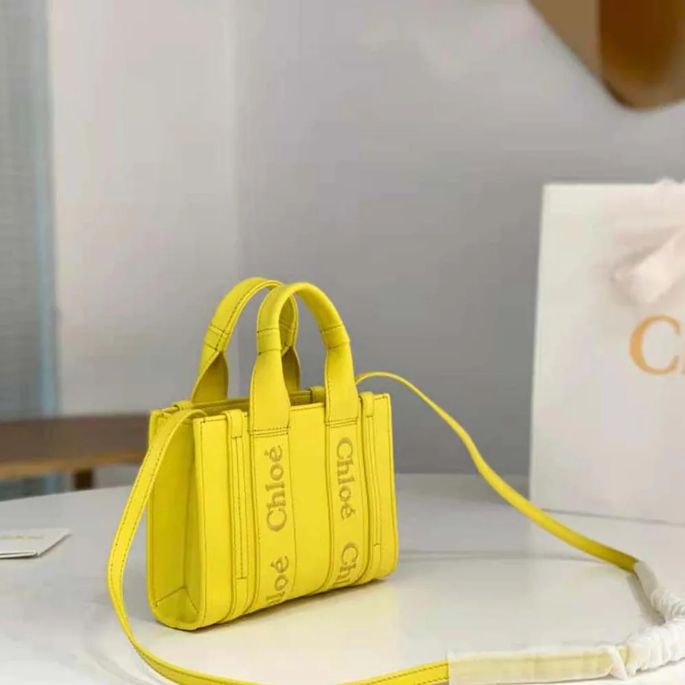 Chloe Mini Woody Tote Bag for Women in Yellow Chloe Mini Woody Tote Bag for Women in Yellow
