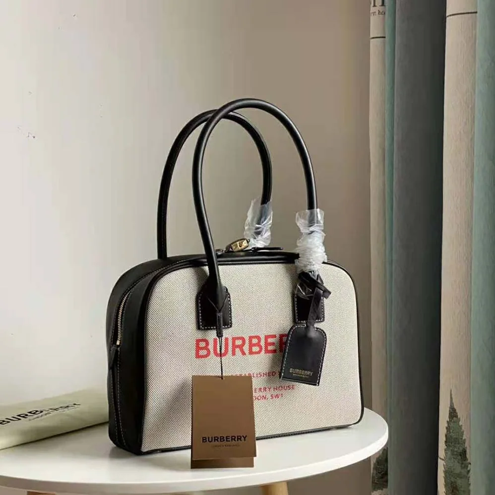 Burberry Medium Horseferry Print Cotton Canvas Half Cube Bag for Women in Black Burberry Medium Horseferry Print Cotton Canvas Half Cube Bag for Women in Black