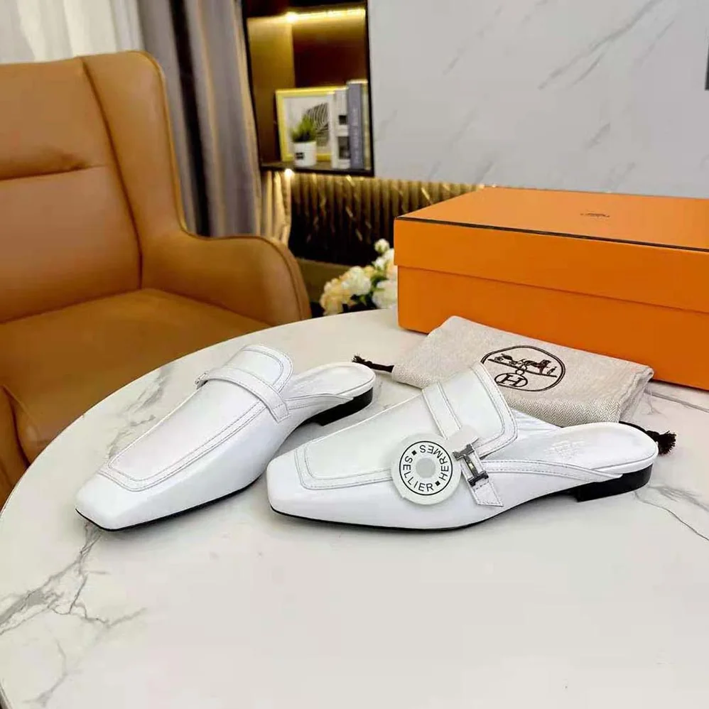 Hermes Groupie Mule in Goatskin with Miniature Palladium-Plated Paris Buckle for Women in White