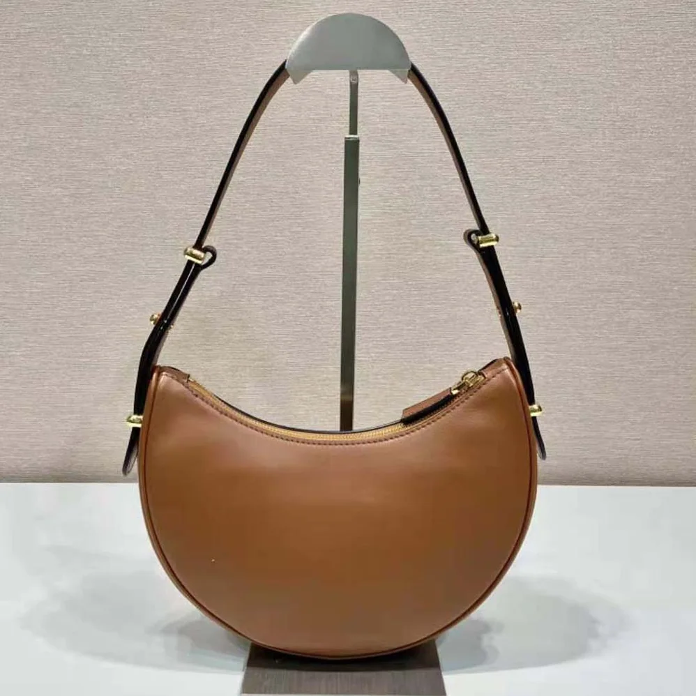 Prada Leather Shoulder Bag with Enameled Metal Triangle Logo for Women in Brown Prada Leather Shoulder Bag with Enameled Metal Triangle Logo for Women in Brown