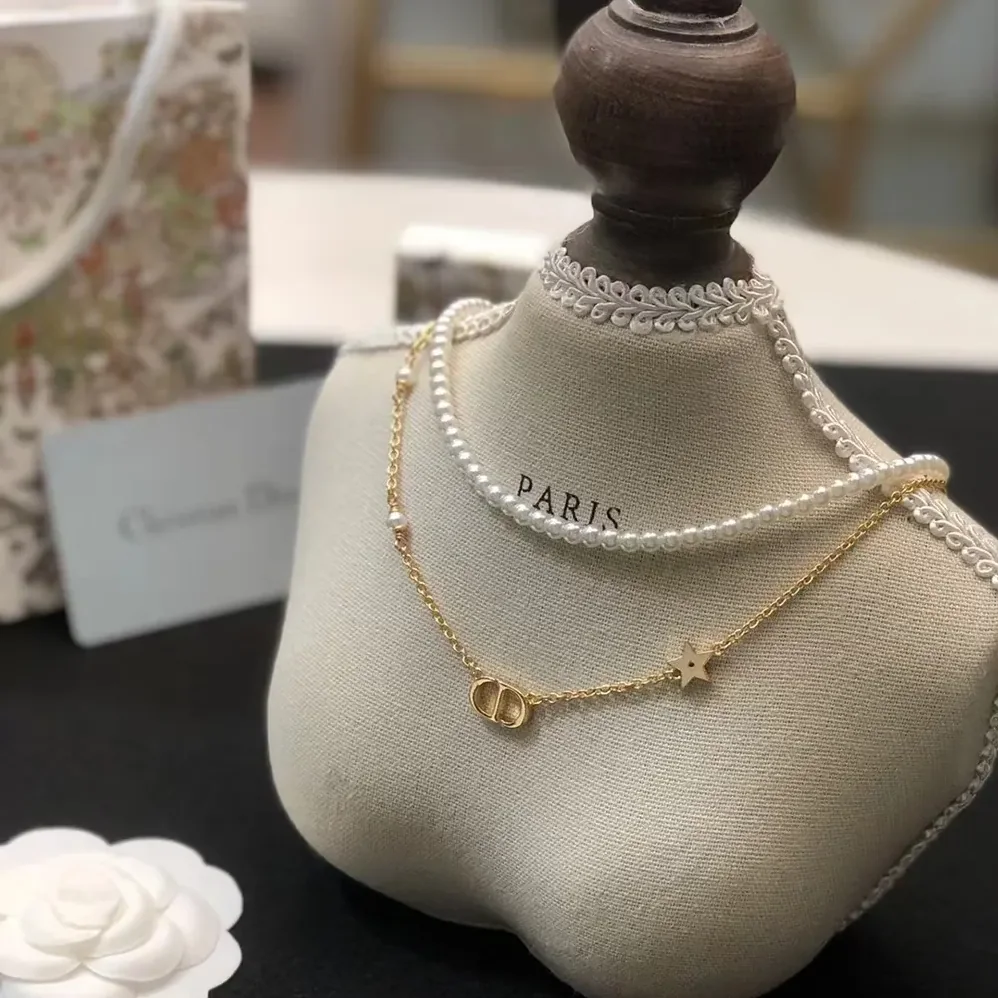 Dior Petit CD Necklace Gold-Finish Metal with White Resin Pearls and Silver for Women in Tone Crystals Dior Petit CD Necklace Gold-Finish Metal with White Resin Pearls and Silver for Women in Tone Crystals