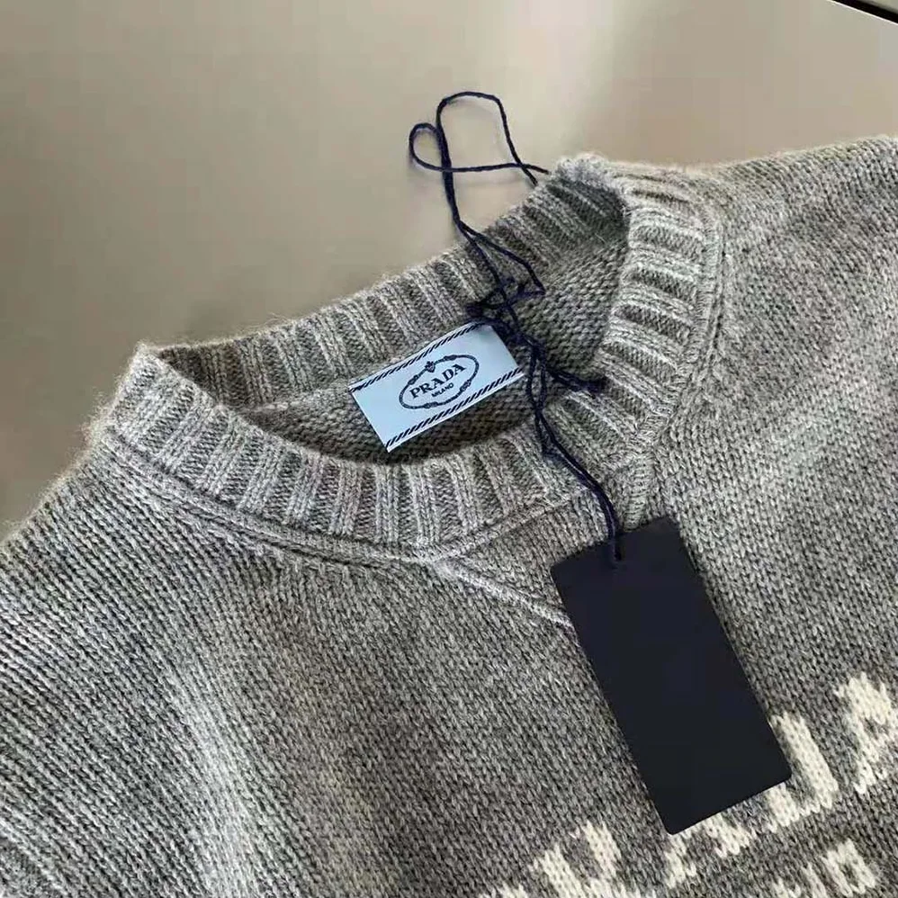 Prada Cashmere and Wool Prada Logo Crew-Neck Sweater for Women in Silver Prada Cashmere and Wool Prada Logo Crew-Neck Sweater for Women in Silver