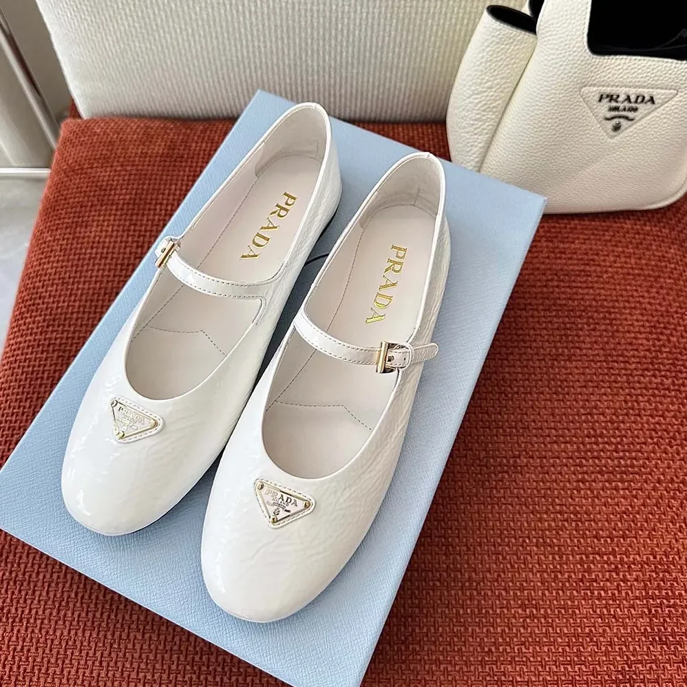 Prada Naplak Patent Leather Ballerinas for Women in White Prada Naplak Patent Leather Ballerinas for Women in White