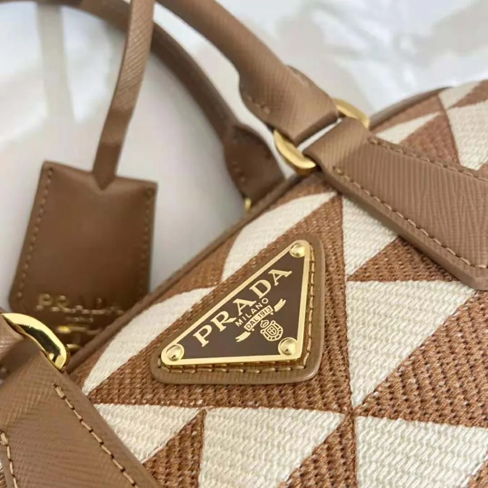 Prada Symbole Embroidered Jacquard Fabric Top-Handle Bag for Women in Brown