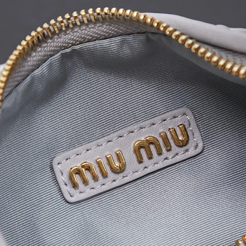 Miu Miu Wander Matelassé Nappa Leather Hobo Bag for Women in Wisteria Miu Miu Wander Matelassé Nappa Leather Hobo Bag for Women in Wisteria
