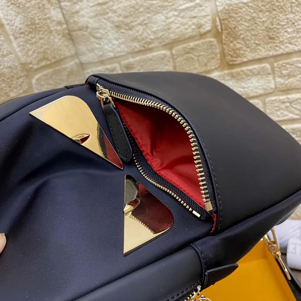 Fendi Monster Sling Bag Nylon And Leather Medium Crossbody Bag In Black for Men Fendi Monster Sling Bag Nylon And Leather Medium Crossbody Bag In Black for Men