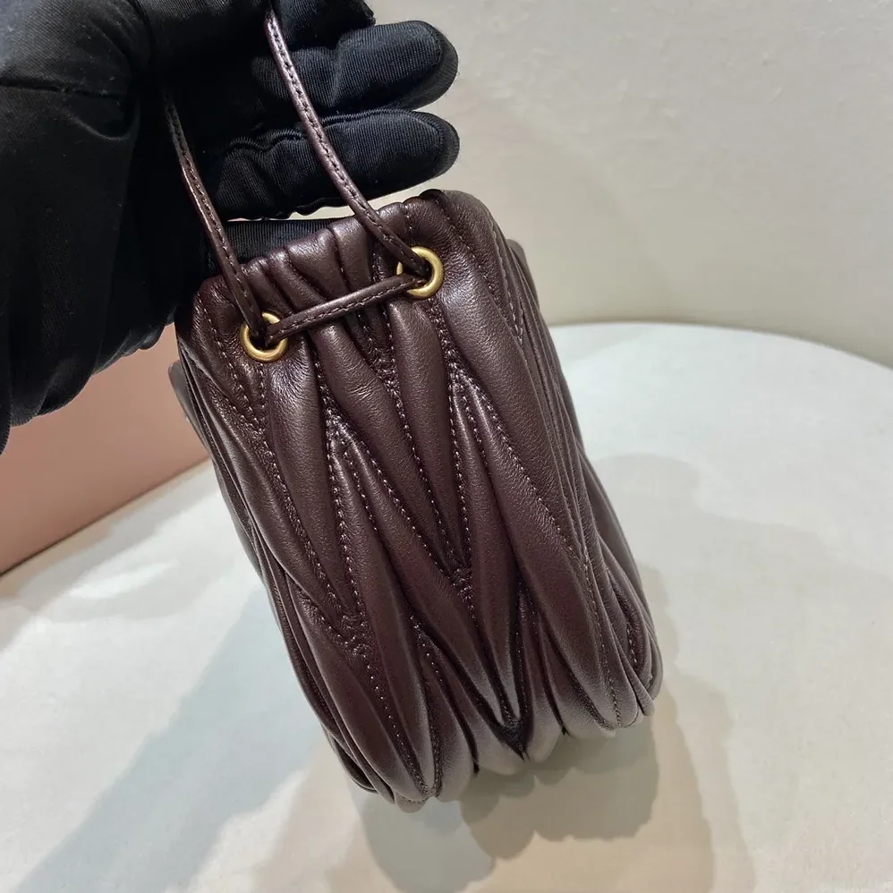 Miu Miu Matelassé Nappa Leather Pouch for Women in Burgundy Miu Miu Matelassé Nappa Leather Pouch for Women in Burgundy