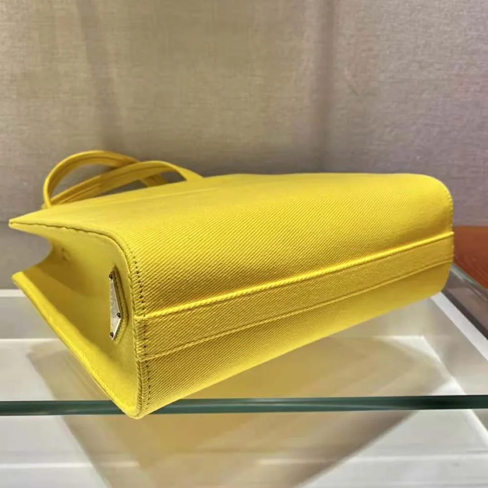 Prada Drill Tote Handles Bag for Women in Yellow Prada Drill Tote Handles Bag for Women in Yellow