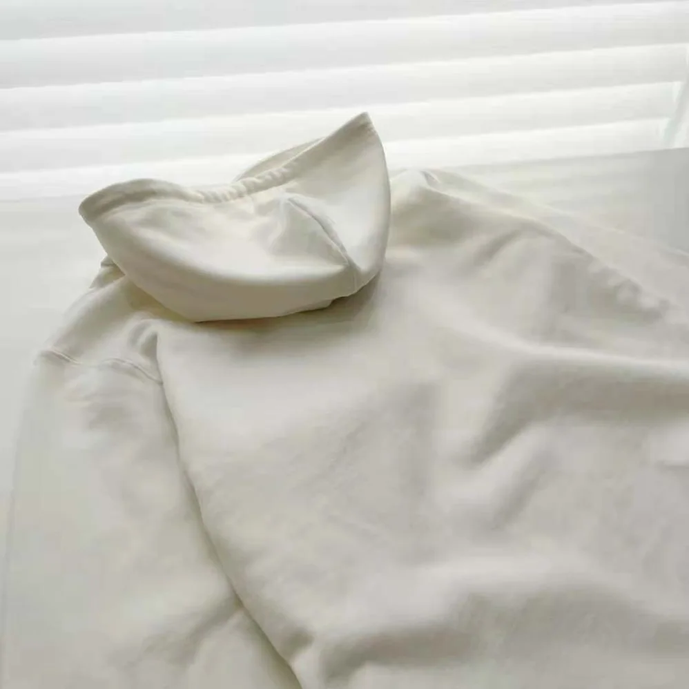 Loewe Calcifer Leather Patch Hoodie in Cotton for Women in White