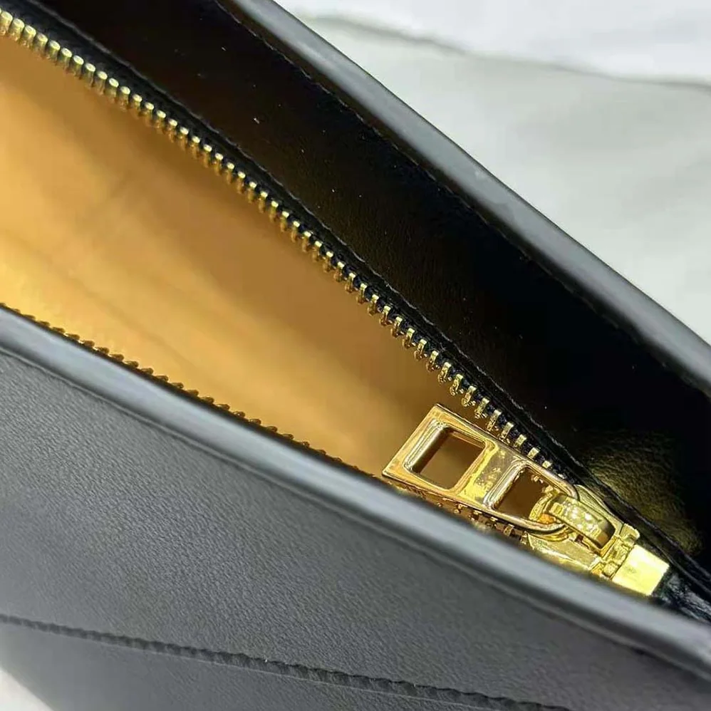 Loewe Cropped Puzzle Fold Bag in Shiny Calfskin for Women in Black Loewe Cropped Puzzle Fold Bag in Shiny Calfskin for Women in Black