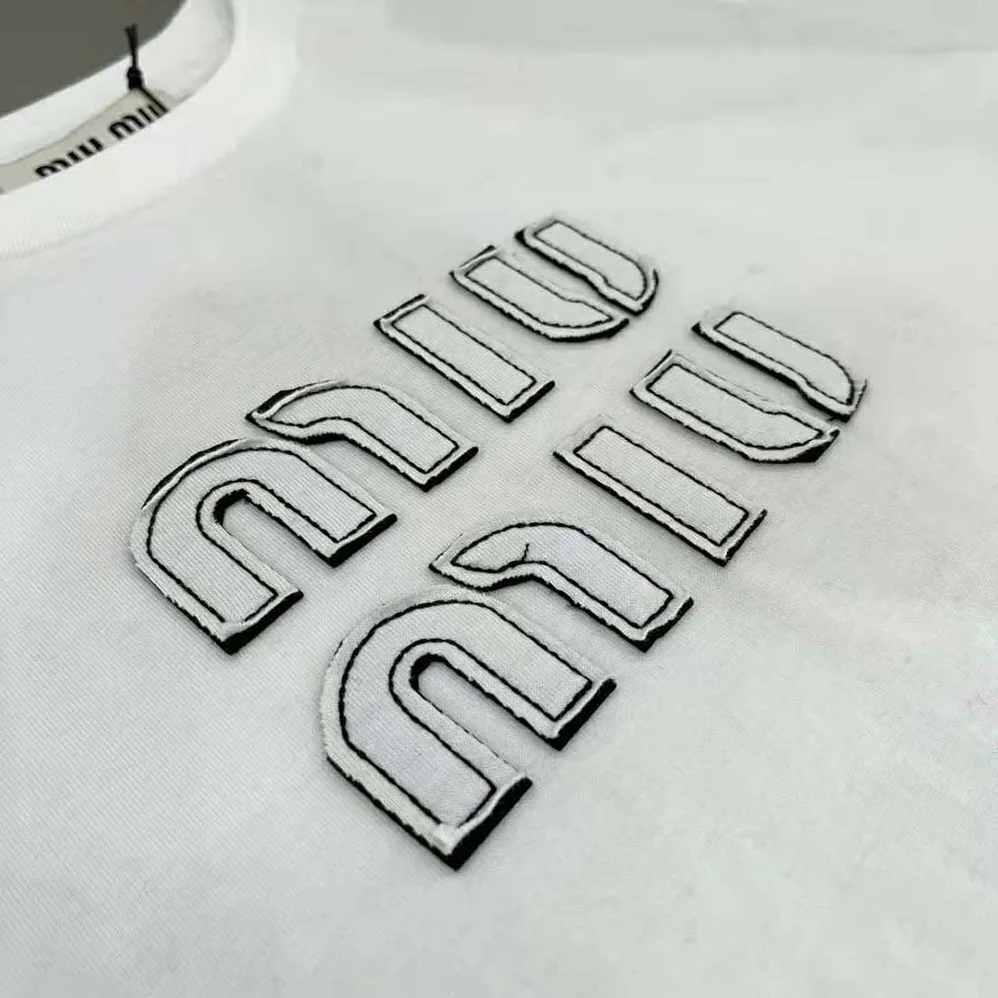 Miu Miu Embroidered Cotton T-shirt with Embroidered Logo for Women in White Miu Miu Embroidered Cotton T-shirt with Embroidered Logo for Women in White