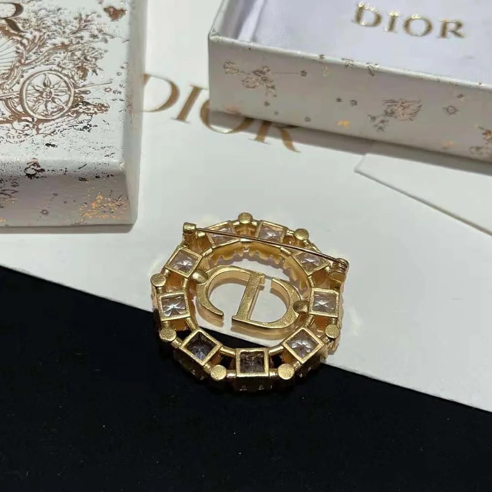 Dior Petit CD Brooch Gold-Finish Metal with White and Silver for Women in Tone Crystals Dior Petit CD Brooch Gold-Finish Metal with White and Silver for Women in Tone Crystals