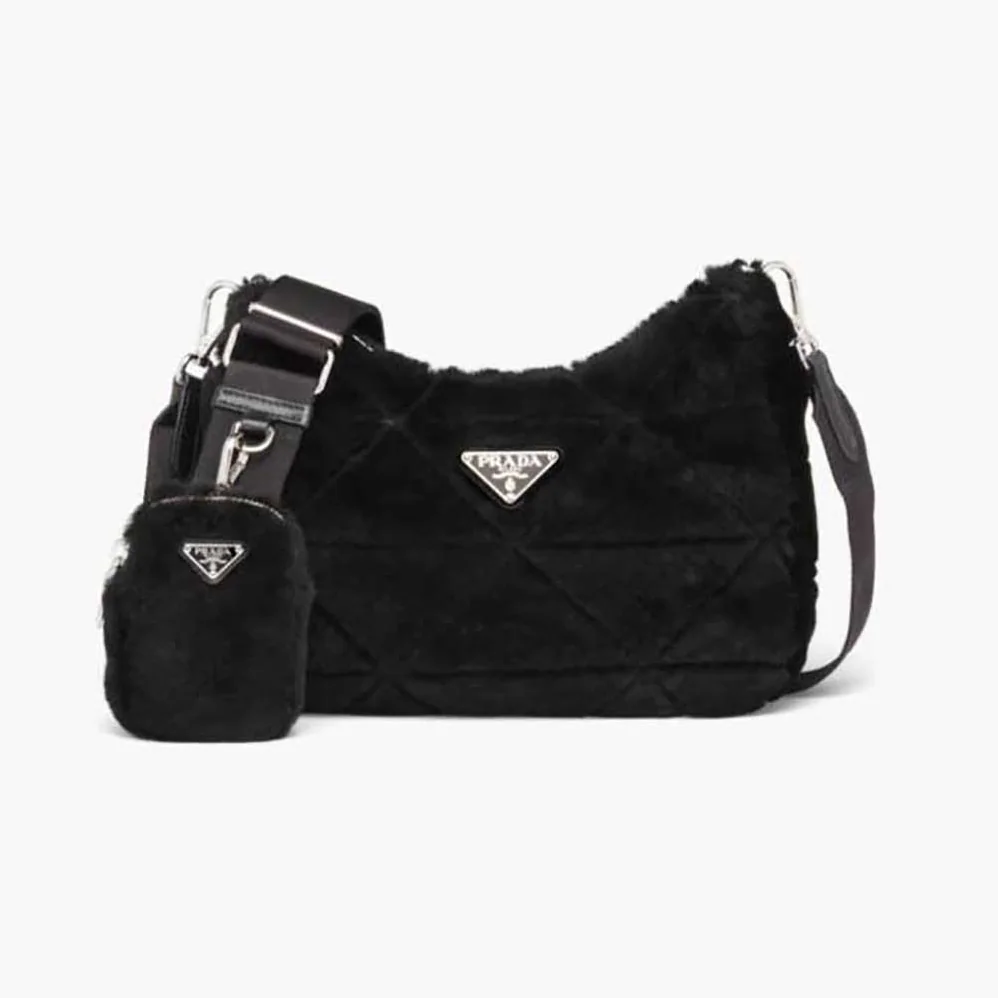 Prada A Patchwork-style Triangle Motif Characterizes Shearling Shoulder Bag for Women in Black Prada A Patchwork-style Triangle Motif Characterizes Shearling Shoulder Bag for Women in Black