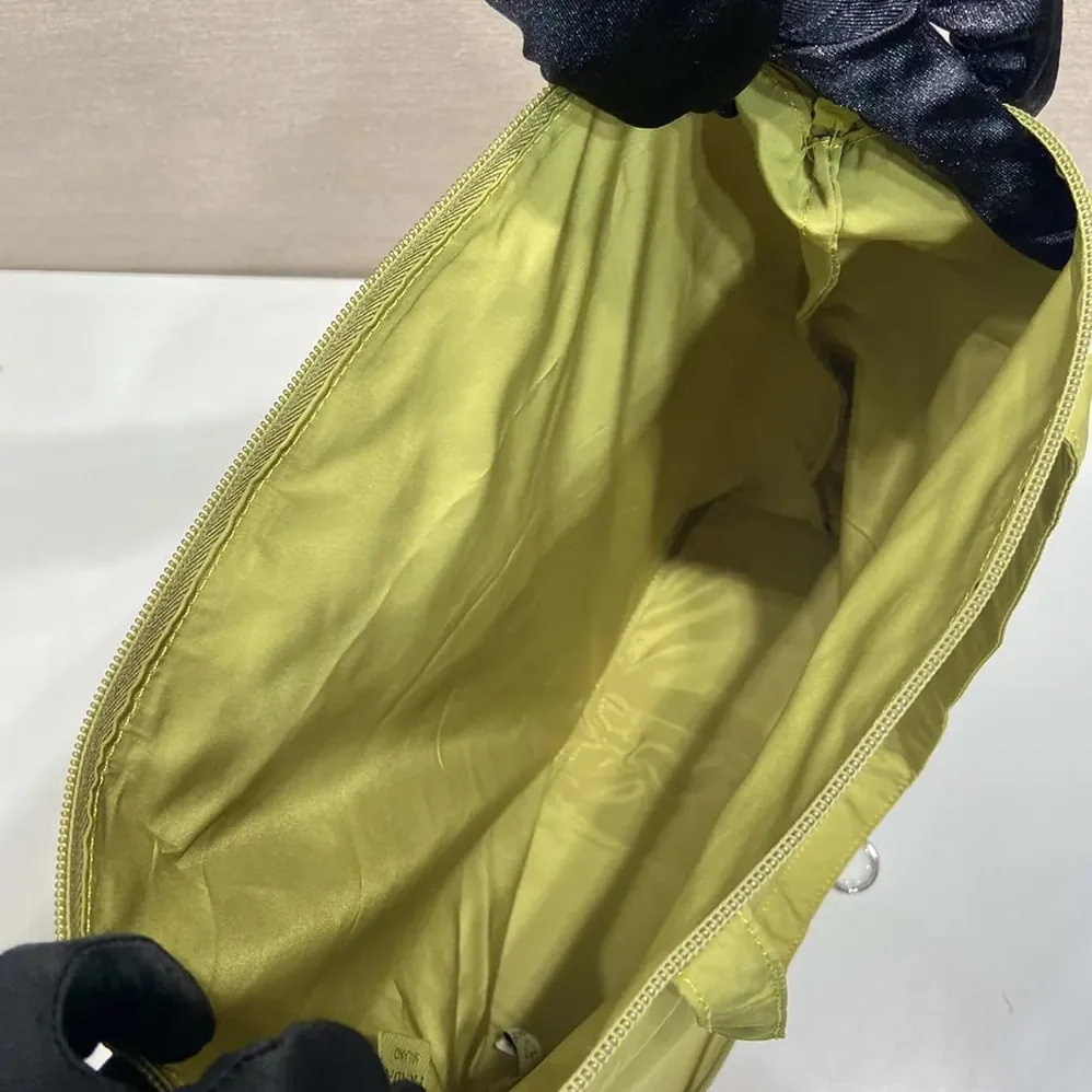 Prada Saffiano Leather Pendant With Re-Nylon Tote Bag for Women in Green Prada Saffiano Leather Pendant With Re-Nylon Tote Bag for Women in Green