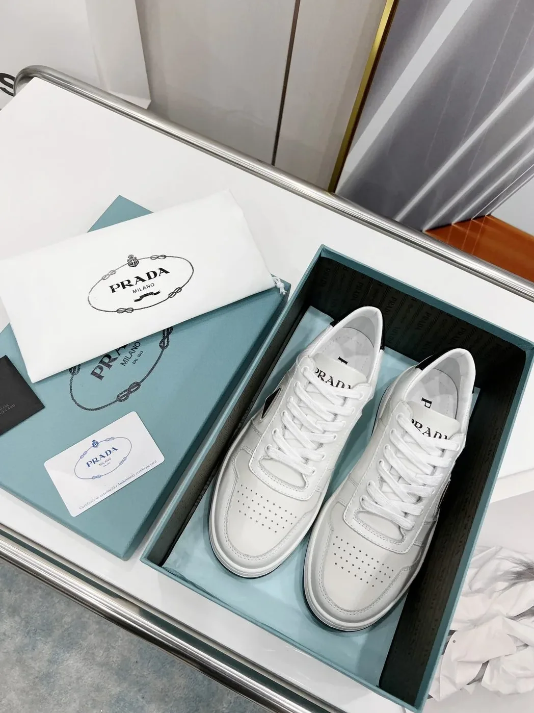 Prada Downtown Perforated Sneakers White in Black /