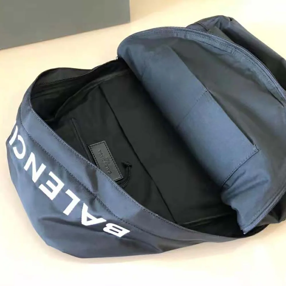 Balenciaga Wheel Backpack in Black Rrecycled Sport Nylon and White Logo Embroidered for Men