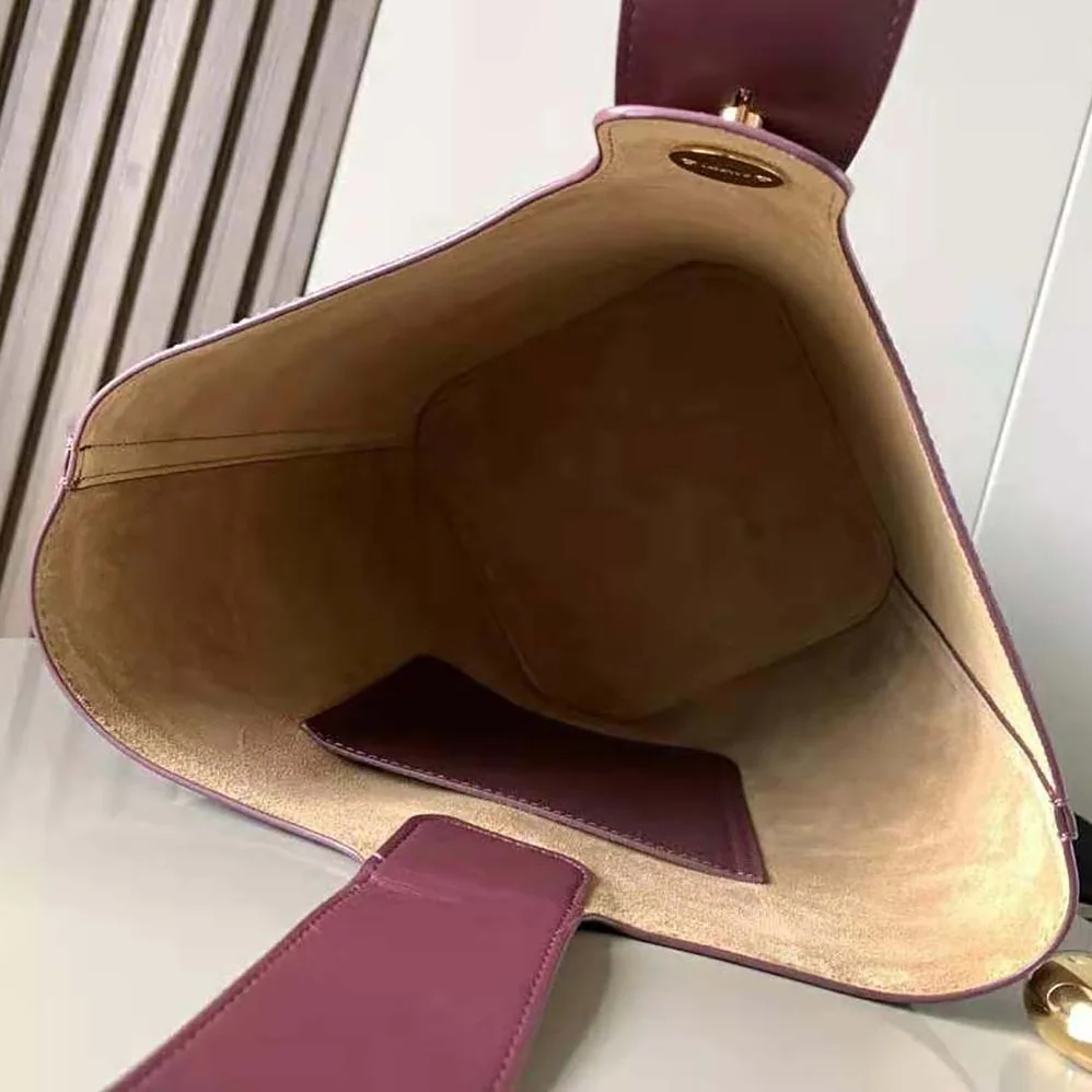 Loewe Mini Pebble Bucket Bag in Mellow Calfskin for Unisex in Maroon