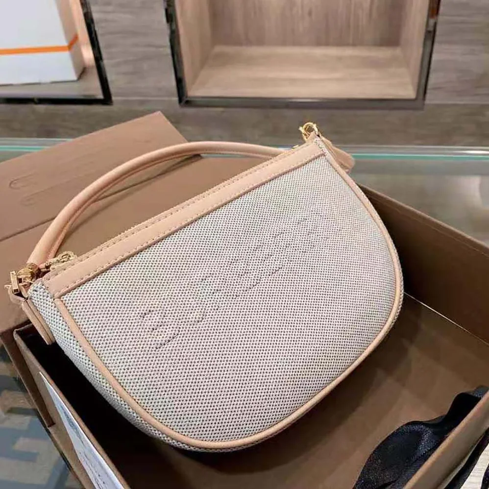 Burberry Embossed Logo Canvas and Leather Olympia Pouch for Women
