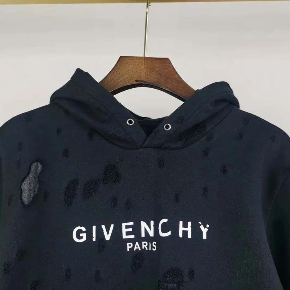 Givenchy Paris Destroyed Hoodie in Coton for Men in Black Givenchy Paris Destroyed Hoodie in Coton for Men in Black