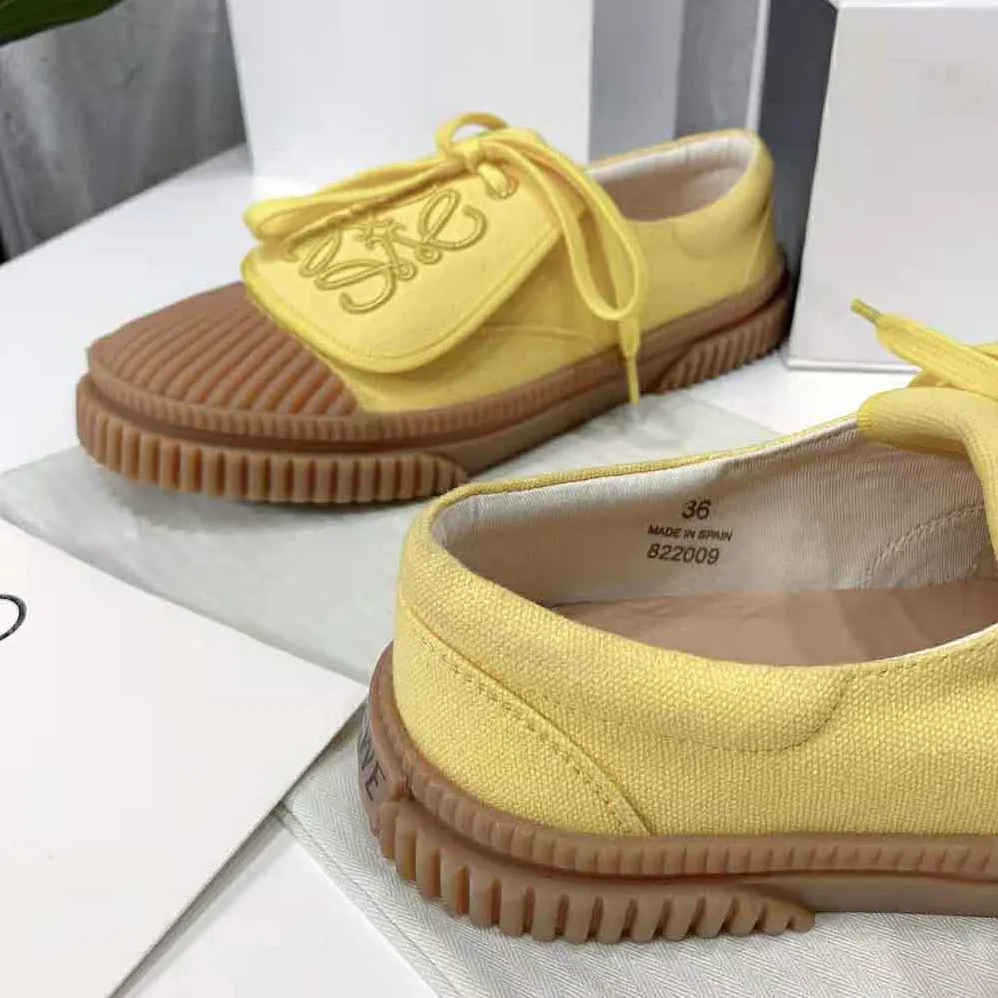 Loewe Anagram Flap Sneaker in Canvas for Women in Yellow Loewe Anagram Flap Sneaker in Canvas for Women in Yellow