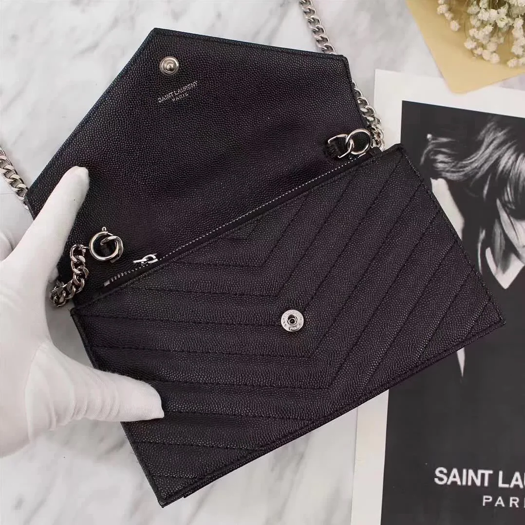 Saint Laurent YSL Medium Monogram Envelope Chain Wallet Silver Hardware in Black Saint Laurent YSL Medium Monogram Envelope Chain Wallet Silver Hardware in Black