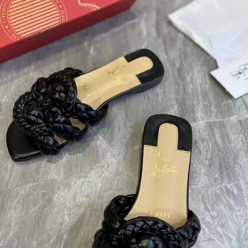 Christian Louboutin Marmela Flat Mule is Modern and Elegant for Women in Black