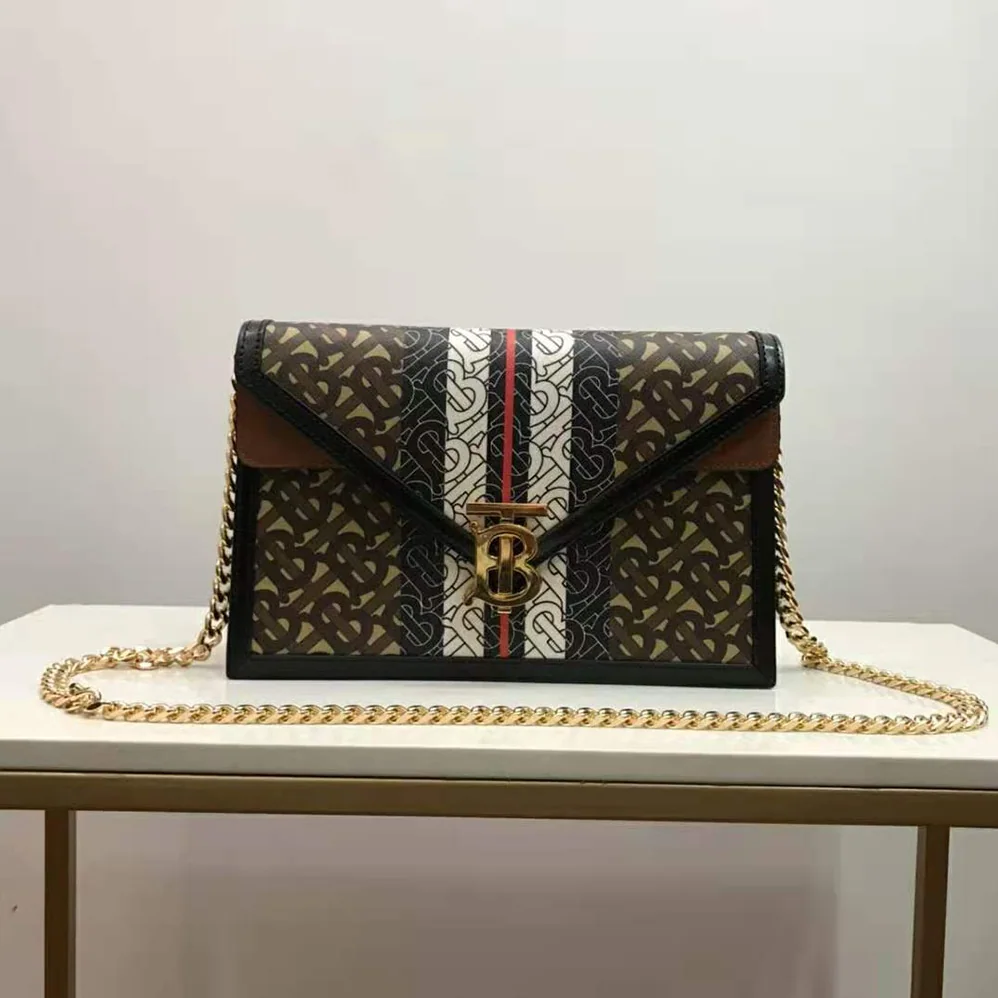 Burberry Small Monogram Stripe E for Women in canvas TB Envelope Clutch Burberry Small Monogram Stripe E for Women in canvas TB Envelope Clutch