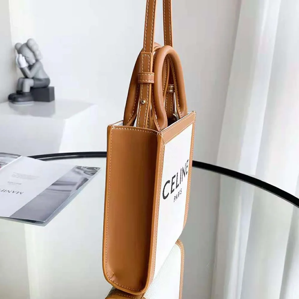 Celine Mini Vertical Cabas Celine in Textile with Celine Print and Calfskin for Women in White Celine Mini Vertical Cabas Celine in Textile with Celine Print and Calfskin for Women in White