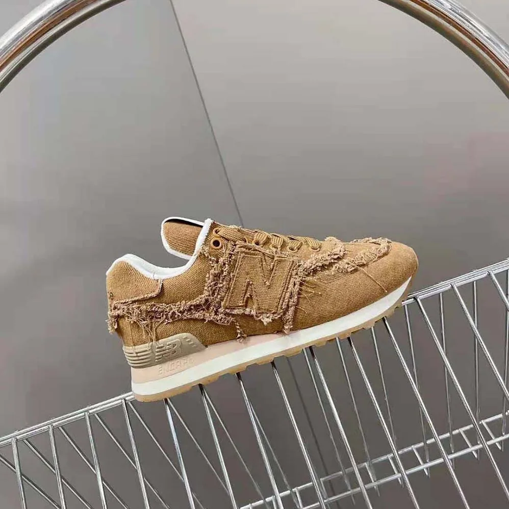Miu Miu New Balance 574 x Miu Miu Marbleized Denim Sneakers for Women in Brown