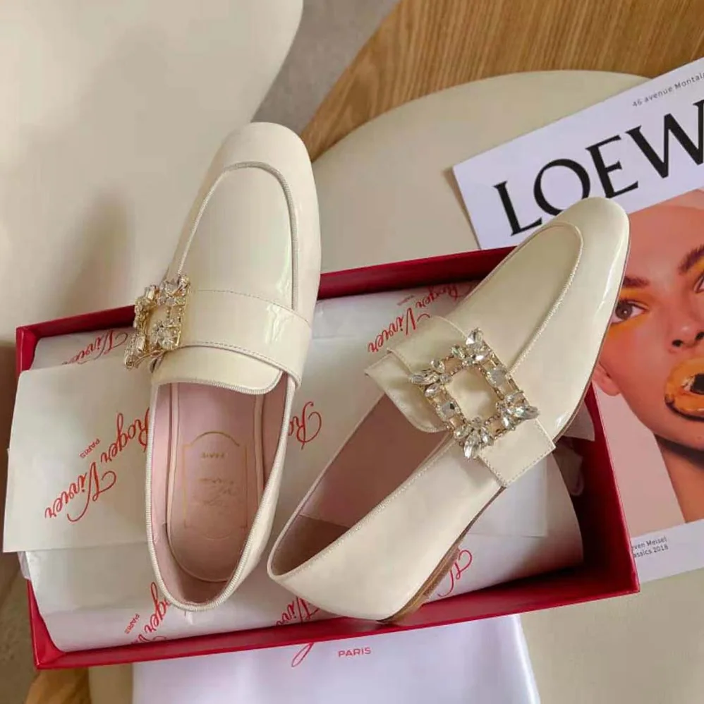 Roger Vivier Mini Broche Vivier Buckle Loafers in Patent Leather for Women in White Roger Vivier Mini Broche Vivier Buckle Loafers in Patent Leather for Women in White