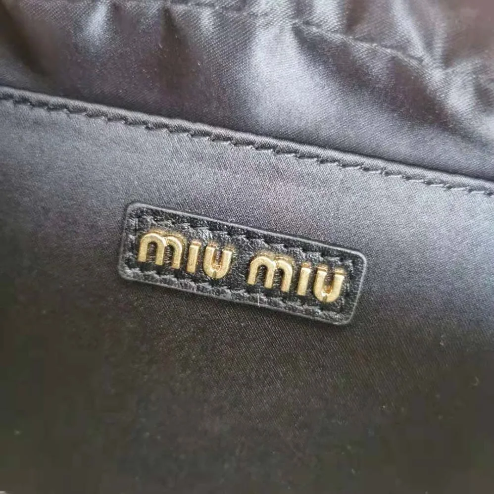 Miu Miu Matelassé Nappa Leather Top-Handle Bag for Women in Black